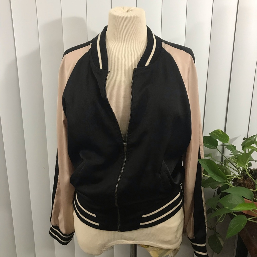 Soft pink and black bomber jacket